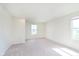 Neutral bedroom with carpeting and ample sunlight from the window at 13204 Caterwood Cir, Fishers, IN 46037