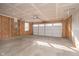 Well-lit garage with a new overhead door and insulation ready for customization at 13204 Caterwood Cir, Fishers, IN 46037
