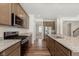 Kitchen featuring granite countertops and stainless steel appliances at 13204 Caterwood Cir, Fishers, IN 46037