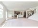 Spacious open-concept living area flowing seamlessly from the kitchen to a large seating area at 13204 Caterwood Cir, Fishers, IN 46037