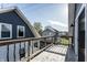 Balcony showing wood flooring and railing with neighborhood views at 1330 Marlowe Ave, Indianapolis, IN 46202