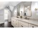 Elegant bathroom with double vanity, stylish mirrors, and modern fixtures, creating a luxurious spa-like experience at 1330 Marlowe Ave, Indianapolis, IN 46202