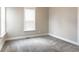 Neutral bedroom with a window allowing plenty of light and neutral carpet at 1330 Marlowe Ave, Indianapolis, IN 46202