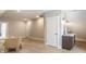A hallway featuring neutral colors and several doors; a glimpse into a well-designed home at 1330 Marlowe Ave, Indianapolis, IN 46202