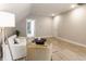 Comfortable living room with modern decor, neutral tones, and plenty of natural light at 1330 Marlowe Ave, Indianapolis, IN 46202