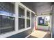 Inviting front porch with lots of natural light and charming design at 1330 Marlowe Ave, Indianapolis, IN 46202