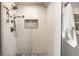 Modern shower with updated fixtures and a tiled design; offers a contemporary and refreshing bathing experience at 1330 Marlowe Ave, Indianapolis, IN 46202