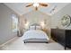 Serene primary bedroom with vaulted ceiling, soft lighting, and neutral decor at 13363 Lantern Rd, Fishers, IN 46038