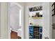 Modern basement with a custom-built bar, wine storage, and contemporary finishes at 1404 Rosebank Dr, Westfield, IN 46074