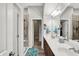 Bright bathroom boasts double sinks and a glass enclosed shower at 1404 Rosebank Dr, Westfield, IN 46074