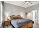 Bedroom features neutral walls, ceiling fan and light wood furniture at 1404 Rosebank Dr, Westfield, IN 46074