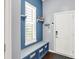 Bright mudroom with bench seating, storage cubbies, and a window with bright natural light at 1404 Rosebank Dr, Westfield, IN 46074