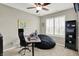 Home office features modern desk, chair, and shelving at 1404 Rosebank Dr, Westfield, IN 46074
