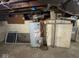 Basement area featuring water heater and exposed mechanicals at 1405 S Ribble Ave, Muncie, IN 47302
