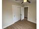 Spacious bedroom with closet space, neutral flooring and a ceiling fan at 1405 S Ribble Ave, Muncie, IN 47302