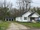 A quaint home with new roof and landscaping, and a detached three car garage at 1405 S Ribble Ave, Muncie, IN 47302