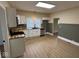Modern kitchen with stainless appliances, light cabinets, and neutral flooring at 1405 S Ribble Ave, Muncie, IN 47302