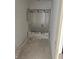 Unfinished bathroom with shower and tub enclosed in plastic wrap for protection at 1439 Elm St, Martinsville, IN 46151