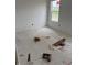 An unfinished bedroom with a window overlooking a new development at 1439 Elm St, Martinsville, IN 46151