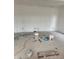 Spacious living room under construction with white walls and ample natural light at 1439 Elm St, Martinsville, IN 46151