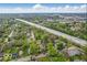 This is an aerial view of the neighborhood and surrounding trees at 1529 E Gimber St, Indianapolis, IN 46203