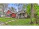 Charming home with a covered front porch and mature trees at 1529 E Gimber St, Indianapolis, IN 46203