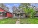 Charming home with a covered front porch and mature trees at 1529 E Gimber St, Indianapolis, IN 46203