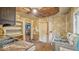 View of kitchen with sink, stove, cabinets and doorway to another room at 1529 E Gimber St, Indianapolis, IN 46203