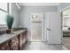 Bright bathroom with a granite countertop vanity with access to the shower and main bedroom at 15617 Westfield Blvd, Carmel, IN 46033