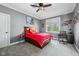 Well-lit bedroom with a neutral carpet, gray walls, and a window with a view to the outdoors at 15617 Westfield Blvd, Carmel, IN 46033