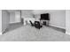 Large bonus room space with carpet flooring, neutral walls, and an entertainment space at 15617 Westfield Blvd, Carmel, IN 46033