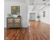 Spacious living room featuring hardwood floors, coffered ceilings, and modern decor at 15617 Westfield Blvd, Carmel, IN 46033