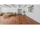 Bright living room with hardwood floors, coffered ceilings and a comfortable sofa at 15617 Westfield Blvd, Carmel, IN 46033