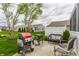 Cozy patio with grill, bench, and chairs, perfect for outdoor dining and entertaining at 16044 Loire Valley Dr, Fishers, IN 46037