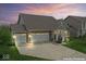 Beautiful home exterior with a three-car garage, brick accents and manicured lawn at 161 Tamarack Larch Blvd, Cicero, IN 46034