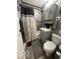 Bathroom with stylish shower and vanity at 1623 Oliver Ave, Indianapolis, IN 46221