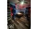 Cozy bedroom with unique decor, fan, and wood plank flooring at 1623 Oliver Ave, Indianapolis, IN 46221