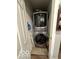 Efficient laundry area with stacked washer and dryer units at 1623 Oliver Ave, Indianapolis, IN 46221