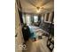 Comfortable living room with ceiling fan and ample natural light at 1623 Oliver Ave, Indianapolis, IN 46221