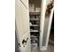 Well-organized pantry with ample shelving providing plentiful storage at 1623 Oliver Ave, Indianapolis, IN 46221