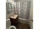 Functional bathroom with updated vanity, and shower at 1716 Arlene Dr, Indianapolis, IN 46219