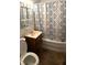 Bright bathroom with updated vanity, shower, and modern fixtures at 1716 Arlene Dr, Indianapolis, IN 46219
