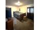 Bedroom with a wooden bed frame and lots of dark toned decor at 1716 Arlene Dr, Indianapolis, IN 46219