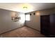 A bedroom with carpet, a window, and wall art at 1716 Arlene Dr, Indianapolis, IN 46219