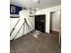 Bedroom with closet, carpet, hockey decor and black bookcase at 1716 Arlene Dr, Indianapolis, IN 46219
