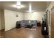 Inviting living room with a gray sectional, complemented by a decorative rug and natural light at 1716 Arlene Dr, Indianapolis, IN 46219