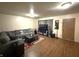 Relaxing living room featuring a gray sectional and entertainment area, great for gatherings and movie nights at 1716 Arlene Dr, Indianapolis, IN 46219