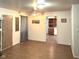 Inviting living room with view to the kitchen, featuring natural light and ceiling fan at 1716 Arlene Dr, Indianapolis, IN 46219