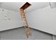 Finished basement with painted floors, ladder, and access panel at 181 Tracy Ridge Blvd, Whiteland, IN 46184