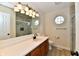 Modern bathroom with marble tiled shower, vanity with solid surface counter and stylish lighting at 181 Tracy Ridge Blvd, Whiteland, IN 46184